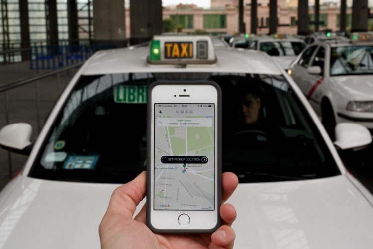 MADRID, SPAIN - OCTOBER 14:  In this photo illustration the new smart phone taxi app 